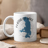 White mug with blue Flathead Lake map and compass graphic, reading "Flathead Lake Montana".
