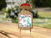 Sled ornament with "Merry Christmas from Lake Eufaula" text and geographical map.