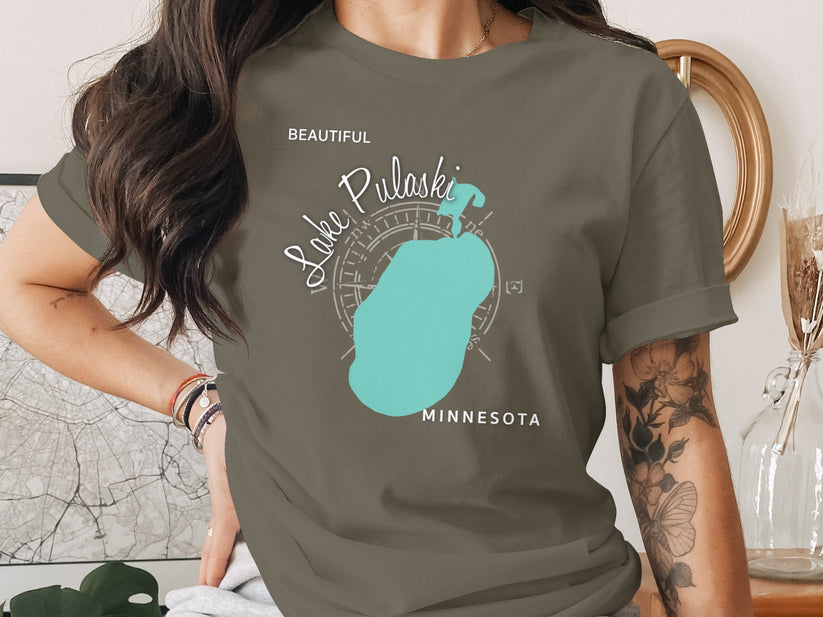 Lake Pulaski Minnesota graphic on a dark olive t-shirt.