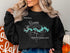 Black sweatshirt with "Beautiful Lake Bowen South Carolina" and compass graphic.