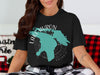 Black t-shirt with teal Lake Huron map and compass design.