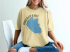Yellow t-shirt with Hauser Lake Idaho map graphic and compass rose.