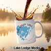 White mug with Big Sandy Lake, Minnesota map and coffee splash.