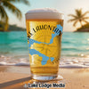 Beer glass with "Lake Lahontan" text and a compass design on a beach.