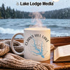 White mug with Clarks Hill Lake Georgia map and compass rose on wooden table.