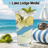 Glass with Lake Erie design, lime, mint, and sunglasses by the sea.