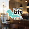 Kabetogama Life sticker of a lake outline with black text.