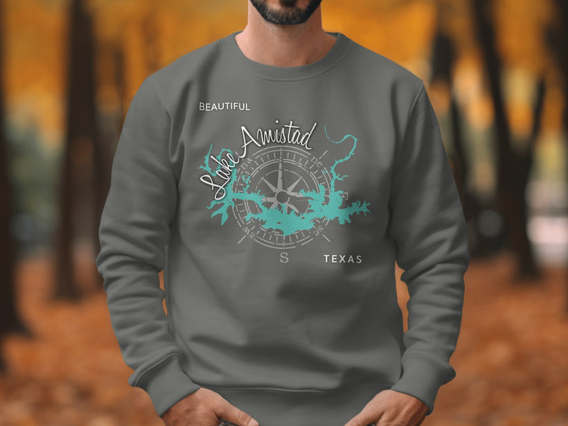 Gray sweatshirt with "Beautiful Lake Amistad Texas" map and compass graphic.