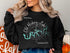 Black sweatshirt with "Old Hickory Lake" and compass design.