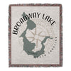 Throw blanket featuring a silhouette map of Broadway Lake, South Carolina and compass.