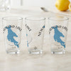 Three clear glasses with blue New Hampshire maps and compass graphics.