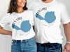 White t-shirts with "Glen Lake Michigan" and blue lake map graphics.