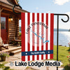 Red and white striped garden flag with "Lake Panorama" and family name.