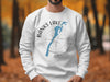 White sweatshirt with Banks Lake, Washington map and compass design.