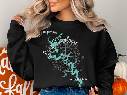 Black sweatshirt with Lake Tuscaloosa, Alabama map and compass graphic.