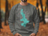 Grey sweatshirt with turquoise West Okoboji Lake map and compass design.