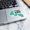 Sticker with teal map outline and bold text "Forest Life" on a laptop.
