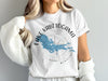 White t-shirt with Lake Kabetogama Minnesota map and compass graphic.