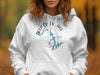 White hoodie with Deep Creek Lake Maryland map design and compass graphic.