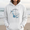 White hoodie with "Lake Oroville California" text and a compass graphic superimposed on a map.