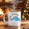 White mug with Lake Superior map, compass, and "Lake Lodge Media" logo.