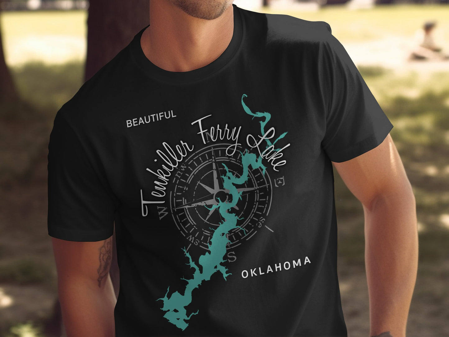 Dark t-shirt with a teal Tenkiller Ferry Lake map and compass graphic.