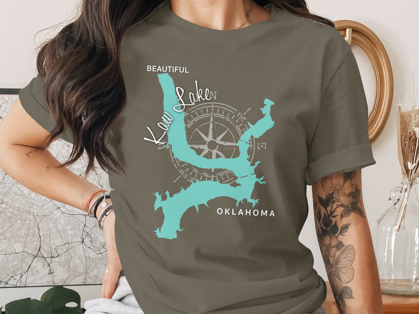 Green t-shirt with Kaw Lake, Oklahoma map and compass design.