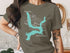 Green t-shirt with Kaw Lake, Oklahoma map and compass design.