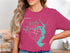 Pink t-shirt with teal Lake Houston Texas map and compass design.