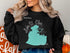 Black sweatshirt with Lake St. Clair, Michigan map and compass graphic.