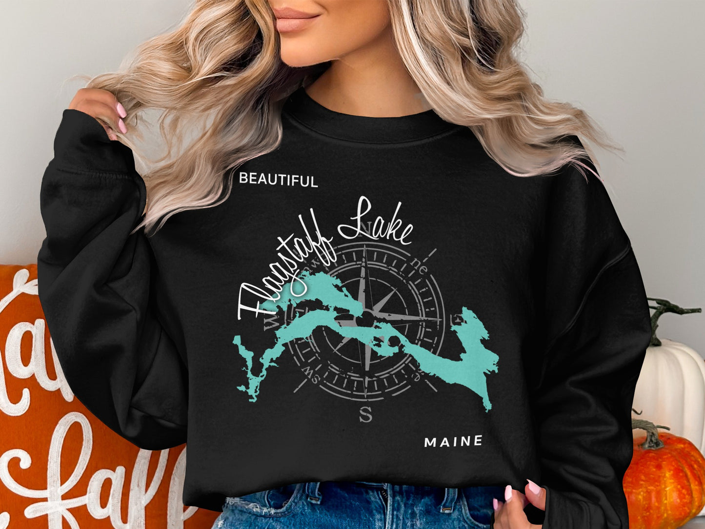 Black crewneck sweatshirt with "Beautiful Flagstaff Lake" and Maine map graphic.
