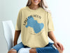 Light yellow t-shirt with Lake Calhoun Georgia map and compass design.
