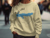Light yellow crewneck sweatshirt with Enid Lake map graphic and Mississippi text.
