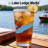 Glass of iced tea with Lake Erie map design and "Lake Lodge Media" logo.