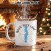 White Rock Lake Texas mug with compass design and coffee splash.