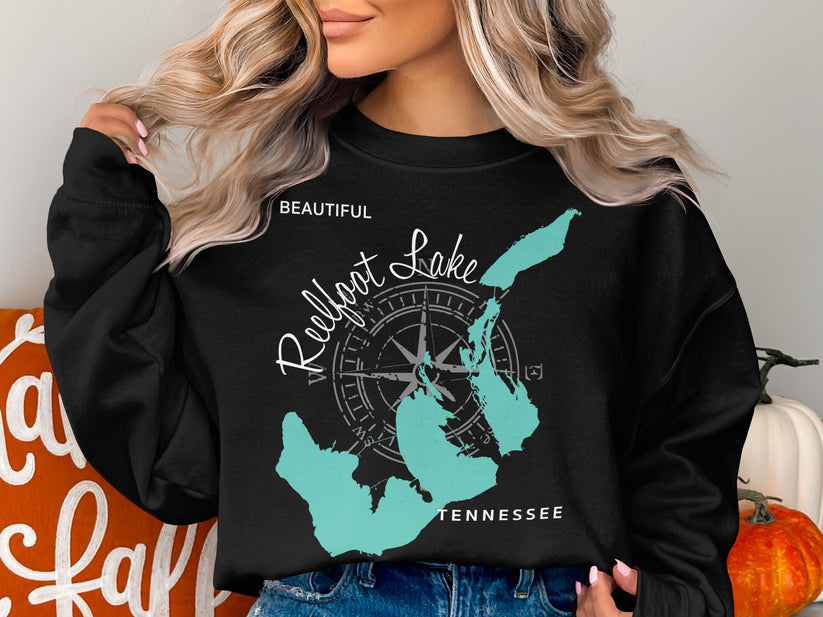 Black sweatshirt with "Beautiful Reelfoot Lake Tennessee" and compass rose graphic.