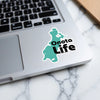 Turquoise Onota Life sticker with black text on a laptop.