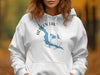 White hoodie with blue map graphic of Montana and compass.