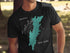 Black t-shirt with a teal map outline of Trout Lake, New York.