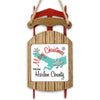 Christmas ornament shaped like a red sled with "Merry Christmas From Harlan County" text.
