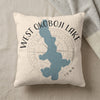 West Okoboji Lake Iowa map on a textured cream pillow with blanket.