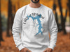 White sweatshirt with blue Lake Lotawana map and compass graphic. Missouri text below.
