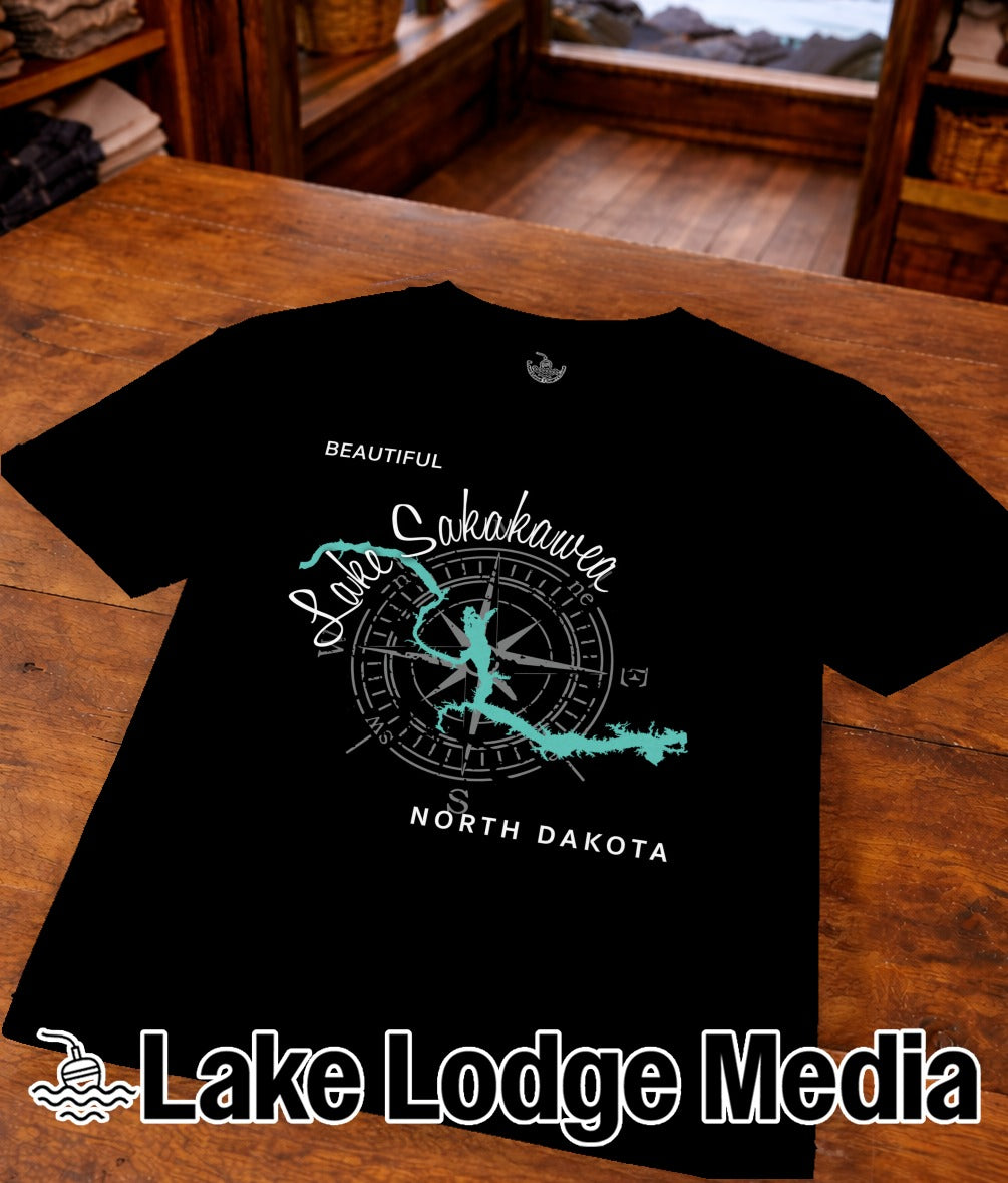 Black t-shirt with Sakakawea Lake, North Dakota compass graphic.