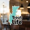 Turquoise lake outline sticker with "Trout Life" text.