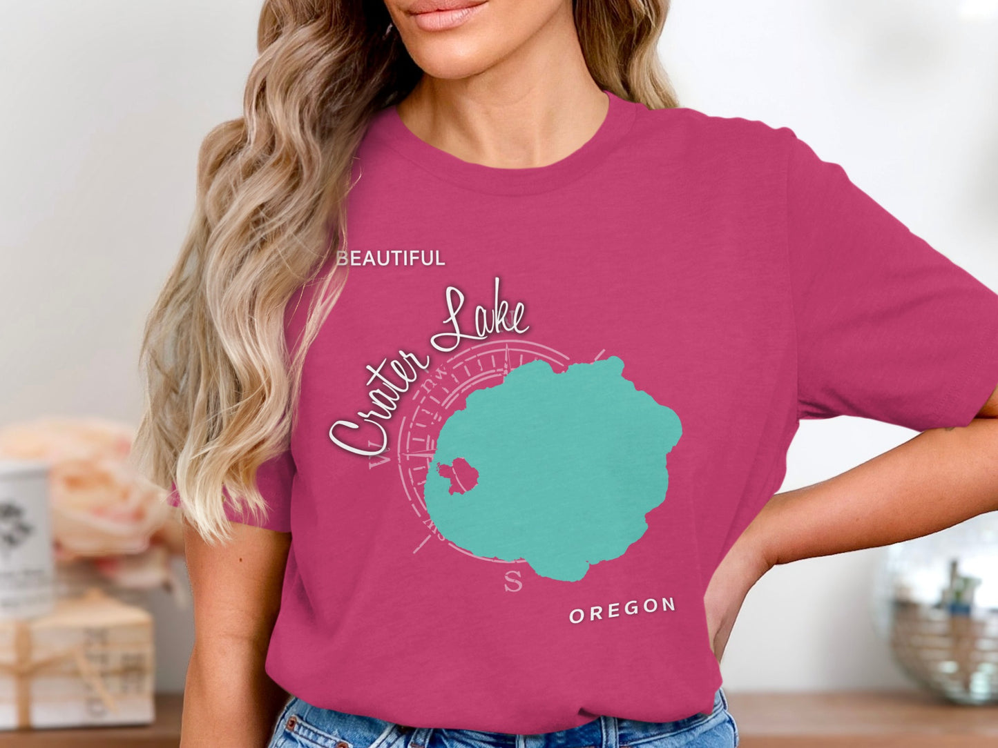 Crater Lake Oregon map graphic on a magenta t-shirt.