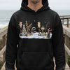 Christmas fishing and winter scene with a bear cub and Christmas tree on a black hoodie.