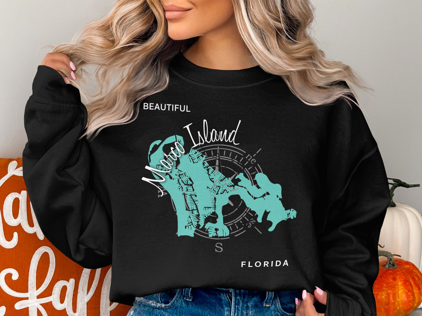 Black sweatshirt with "Beautiful Marco Island Florida" map design and people silhouettes.