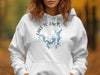 White hooded sweatshirt with Lake Texoma Texas map and compass graphic.