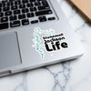 Stonewall Jackson Life sticker with lake outline on laptop keyboard.