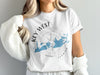 White t-shirt with "KEY WEST FLORIDA" text and a blue map illustration.
